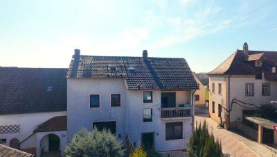 Platz für Generationen – Zweifamilienhaus mit Gartenparadies und Nebengebäude