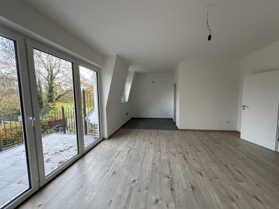 Erstbezug: 4 Zimmer-Wohnung mit Weitblick ins Grüne! KFW 40