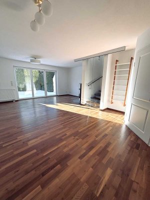 ATTRAKTIVE DOPPELHAUSHÄLFTE MIT SÜDGARTEN IN RUHIGER LAGE VON MÜNCHEN-TRUDERING