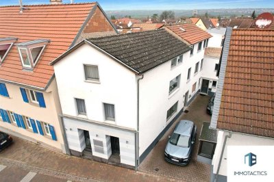 Vielseitiges Familienhaus mit vermieteter Bürofläche in Nieder-Olm! Wohnen & Arbeiten im Zentrum.