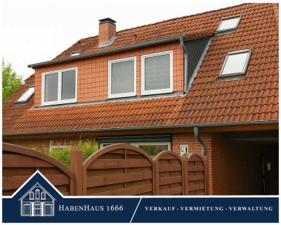 Charmante Dachgeschosswohnung mit Gartenanteil in ruhiger Lage
