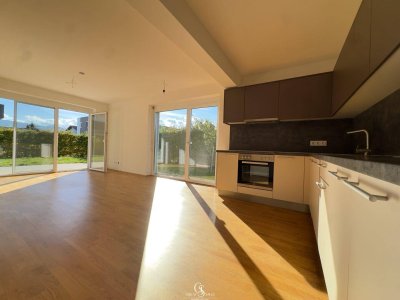 Sonniger Gartentraum im Neubau: 4 Zimmer, Terrasse, Garten und Carport!