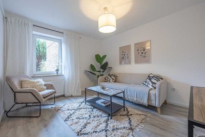 Ihr neues Zuhause in Fockbek, 3-Zimmer-Erdgeschosswohnung mit sonniger Terrasse und eigenem Carport