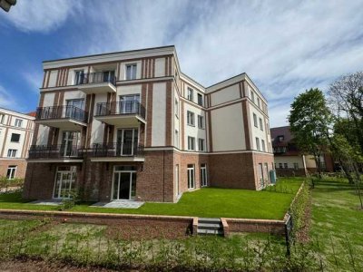 Sehr gut gelegene 3-Zimmer-Neubauwohnung mit Garten und Tiefgarage in Beelitz-Heilstätten