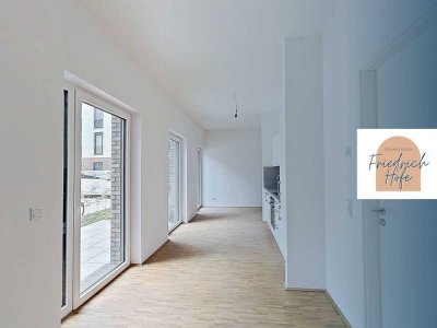Moderne 2-Zimmer-Terrassenwohnung mit Einbauküche im Neubauquartier 'Großherzog Friedrich Höfe'