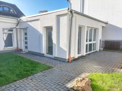 Wunderschöne stufenlose Erdgeschosswohnung mit Garten