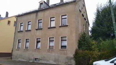 Mehrfamilienhaus in Oelsnitz - teilweise vermietet zum Modernisieren