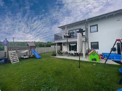 Moderne 4-Zimmerwohnung mit Terrasse und großzügigem Garten