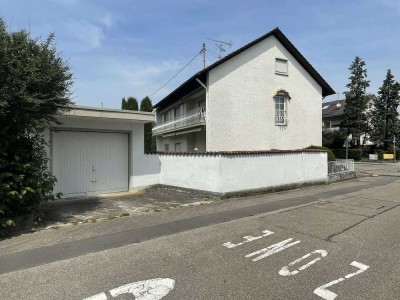 Projektchance in Teningen: Renovierungsbedürftiges Wohn- & Geschäftshaus mit Potenzial