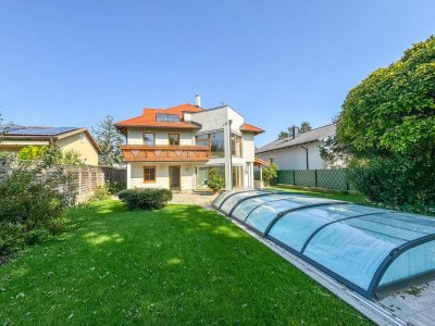 Exklusives Wohnen vor den Toren Wiens – Traumhaftes Haus mit Garten &amp; Pool