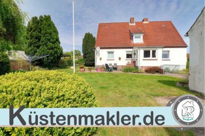 Strande ruft: Haus mit Charme auch ideal für Neubau am Meer – aktuell vermietet, später Ihr Zuhause?