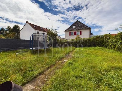 Wohn- und Geschäftshaus in St. Ingbert mit großer Wohnung, Gewerbeeinheit, Garten und Garagen