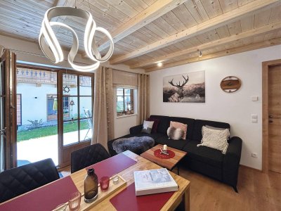 FERIENWOHNUNG – alpiner Wohntraum mit Garten, ihr Rückzugsort in den Bergen mit TOP–Rendite
