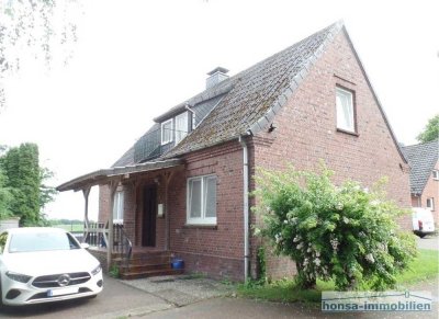 Gyhum - nur noch einziehen, Einfamilienhaus mit angrenzender, vermieteter Wohnung