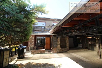 Einfamilienhaus mit Einliegerwohnung und Werkstatt in ruhiger grüner Lage in Forst