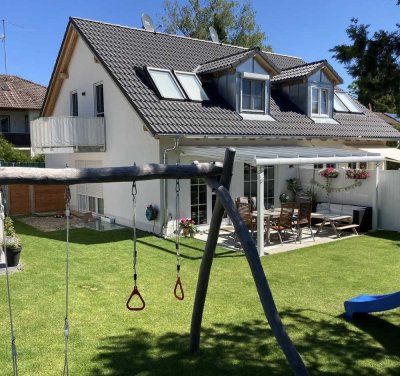 Moderne Doppelhaushälfte mit Garten in Grünwald