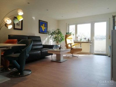 Außergewöhnliche 3 Zimmer-Wohnung mit exklusiver Dachterrasse