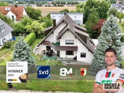 Charmantes und ebenso außergewöhnliches Einfamilienhaus mit großzügigem Wohnkonzept in ruhiger Lage