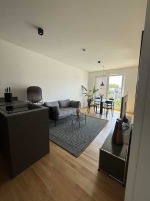 Moderne 2-Zimmer-Wohnung mit Balkon & TG im Neuhofquartier