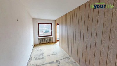 Zentrumsnahes Apartment mit Tiefgaragenstellplatz – renovierungsbedürftig