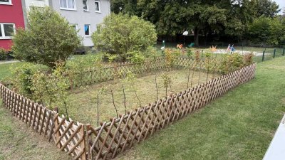 Familienfreundliche 3 Zimmer-Wohnung mit EBK und Garten