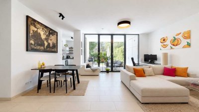 Helle, moderne Gartenwohnung mit Sonnenterrasse und Garagenstellplatz