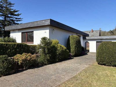 Großzügiger Bungalow mit Vollkeller und großem Grundstück in bevorzugter Lage