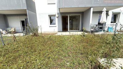 Moderne Neubauwohnung mit EIGENGARTEN und TERRASSE nahe Akademiepark