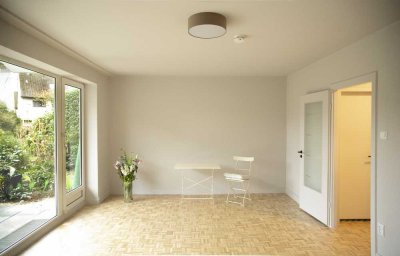 Renovierte Erdgeschosswohnung mit Terrasse und Tiefgaragenstellplatz