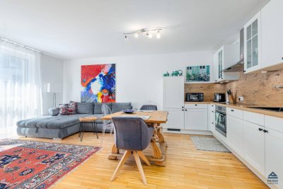 RUHE. SONNE. WALLERSEE. 2-Zimmer-Wohnung mit sonnigem Balkon und Tiefgarage