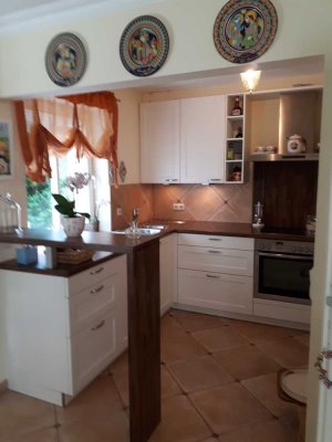 Wunderschöne 3-Zimmer-Maisonettewohnung mit grossem Privatgarten