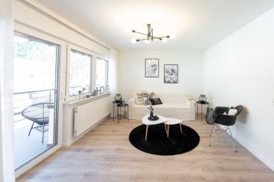 ERSTBEZUG NACH SANIERUNG! Schöne, sanierte Eigentumswohnung mit Balkon, Terrasse und Grünfläche