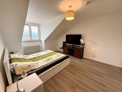 Attraktive Kapitalanlage in Grenznähe – vermietete 2-Zimmer-DG-Wohnung mit TG-Stellplatz