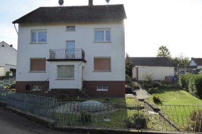 Mehrfamilienhaus, ruh. Lage, m. Fernbl. a. d. Wiesen u. Felder in Langanhain-Ziegenberg b. Bad Nauh.