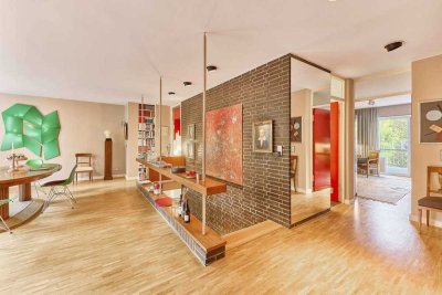 Außergewöhnliche und großzügige Maisonette-Wohnung mit Hofgarten in Bestlage