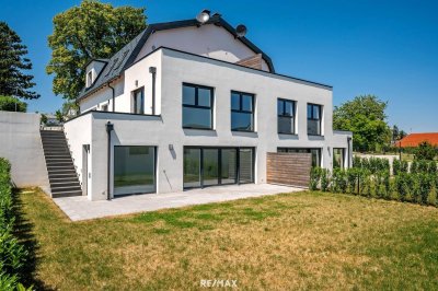 Erstbezug: Großzügiger Familientraum mit unverbaubarem Grünblick!