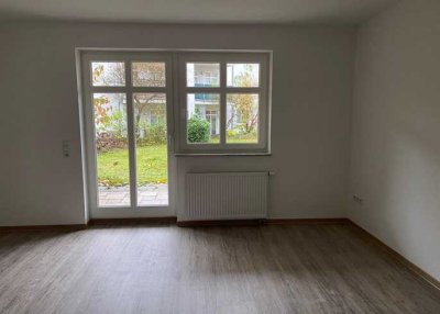 Moderne Singlewohnung mit offener Küche und Terrasse
