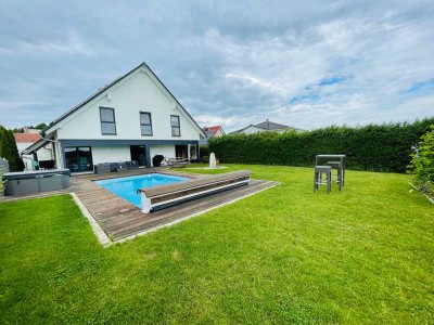 Luxuriöses Einfamilienhaus mit Wellnessoase, Pool und exklusiver Ausstattung–Wohnen auf hohem Niveau