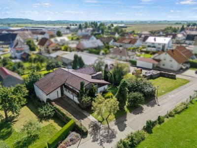 Wohnen auf einer Ebene! Charmanter Bungalow mit zusätzlichem Baugrundstück in bevorzugter Wohnlage