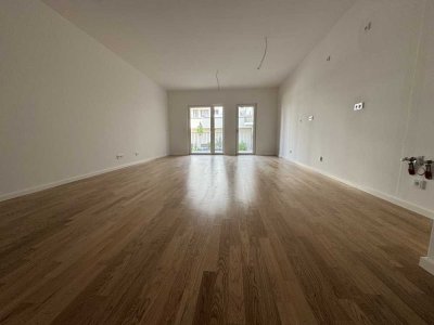 Erstbezug!: 4-Zimmer-Wohnung im Erdgeschoss mit Balkon
