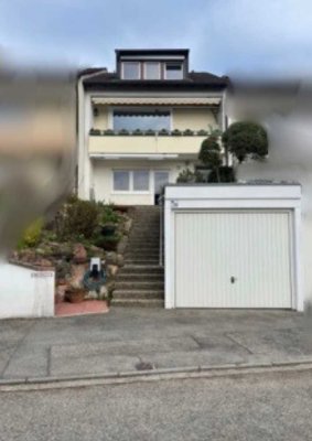 Reihenmittelhaus mit Einliegerwohnung, Garage, Wintergarten und 22 kW E-Tankstel in Lörrach-Stetten