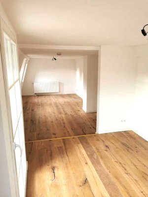 Exquisite 2,5-Zimmer Maisonette-Wohnung im Herzen der Stadt