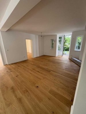 Provisionsfrei: Sanierte 3-Zimmer-Erdgeschosswohnung mit Terasse und Gartenanteil