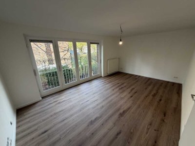 Frisch sanierte 2-Zimmer-Hochparterrewohnung in gepflegter  Wohnanlage mit Pool & Sauna