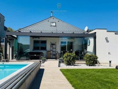 ## Tophit...generalsanierte, multifunktionelle,vollunterkellerte Wohnoase mit Pool und Gartenoase !!
