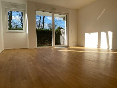 Moderne 2,5-Zimmer-Wohnung, Terrasse mit Gartenanteil, Fußbodenheizung, Einbauküche!