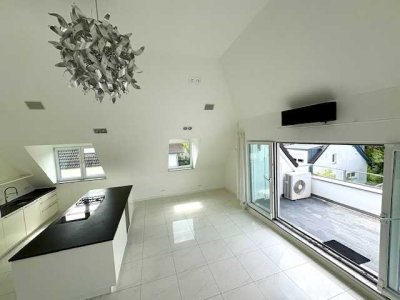 Lichtdurchflutetes Penthouse mit Dachterrasse nebst getrennten Hobbyraum im Souterain