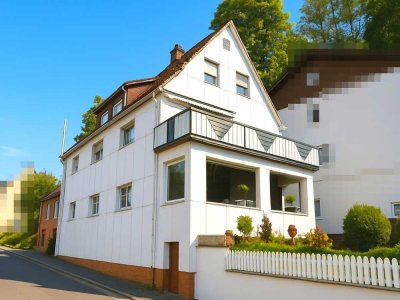 Solides Zweifamilienhaus mit Nebengebäude in idyllischer Lage von Tettau