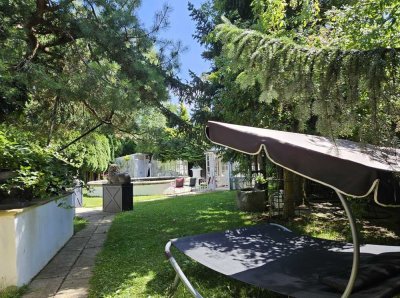 Wohnen im Grünen: Traumhaus mit Gartenidylle und Privatsphäre pur
