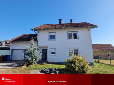 Hünstetten-Beuerbach: Freistehende Immobilie mit Doppelgarage und Garten